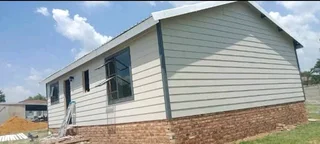 AtoZ log homes call 0699765929