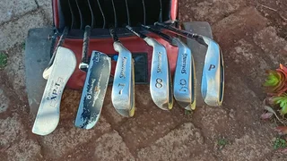 Golf clubs and golf on push cart