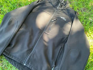 First Ascent Oracle or Phantom XT-1/XT-2 men's black softshell jacket.