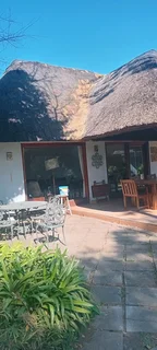 Thatching. Lapa. Decking.  Swimming pool.