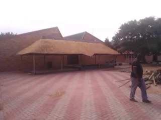 Thatching. Lapa. Decking.  Swimming pool.