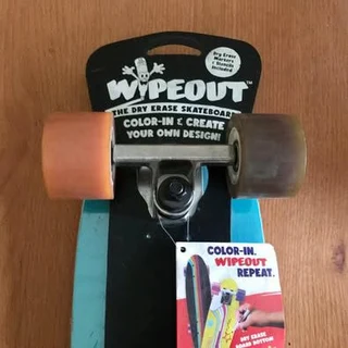 Brand new sealed Wipeout Dry Erase Skateboard Monsters - Pink/Teal