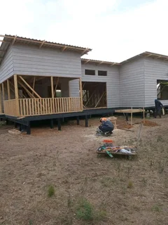 Marc log home and nutec house