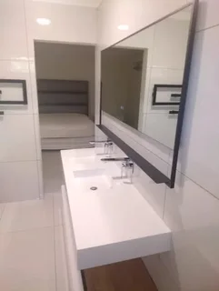 WE SPECIALIZE IN BATHROOMS RENOVATIONS TILERS PLUMBERS PAINTERS CARPENTER HANDYMAN WATERPROOFING