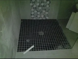 WE SPECIALIZE IN BATHROOMS RENOVATIONS TILERS PLUMBERS PAINTERS CARPENTER HANDYMAN WATERPROOFING