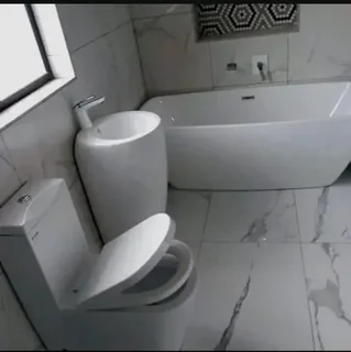 WE SPECIALIZE IN BATHROOMS RENOVATIONS TILERS PLUMBERS PAINTERS CARPENTER HANDYMAN WATERPROOFING