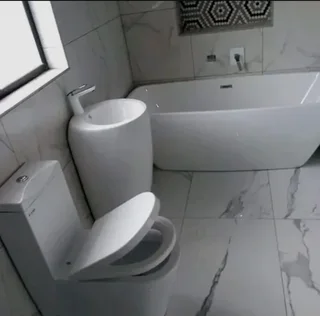 HANDYMAN AND HOME RENOVATORS TILER CARPENTER BUILDER DRYWALL PAINTER PLUMBER WATERPROOFING