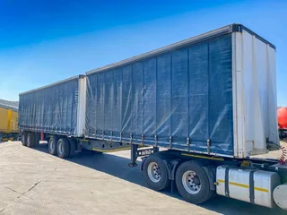 Flat deck , tautliner trucks and trailers available