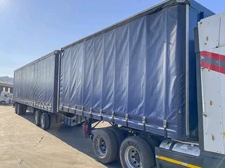 Flat deck trailers , tautliners, side tippers