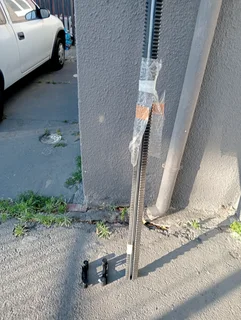 Gate Motor, rails and magnetic stoppers. With New Battery