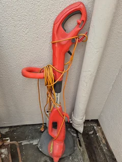 Lawn Mower And A Trimmer