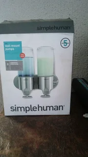 Simple human Wall mount soap dispenser