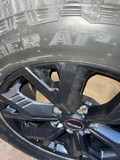 Fairly used 265/60/18 General Grabber tyres and rims (4) off Isuzu V-Cross. Taken off at 6000km.