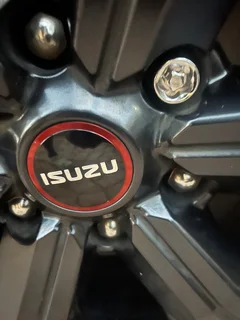 Fairly used 265/60/18 General Grabber tyres and rims (4) off Isuzu V-Cross. Taken off at 6000km.