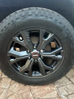 Fairly used 265/60/18 General Grabber tyres and rims (4) off Isuzu V-Cross. Taken off at 6000km.