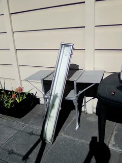 Outside braai area fluorescent light fitting only R300