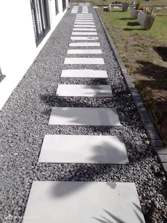 NEGOTIABLE TREE FELLING SERVICE AND GARDEN STONES DECORATION