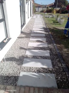 NEGOTIABLE TREE FELLING SERVICE AND GARDEN STONES INSTALLATION