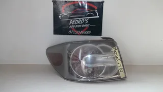 Mazda CX-7 ('07-'12) tail light (Left)