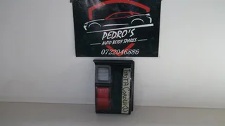 Toyota Corolla ('89-'93) tail light (Left) inner license plate light