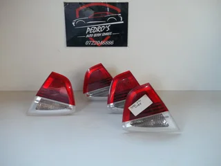 BMW (E90) (2008) Tail light inners (Left & Right). Sold Seperately.