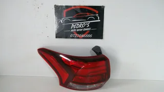 Mitsubishi Outlander left tail light