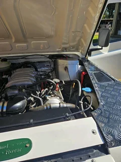 White Land Rover Defender with complete Lexus 4,3 VVT V8 Engine and Gearbox Conversion for sale