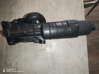 Mercedes Benz W204 C Class and W212 E Class M271 CGI oil cooler and oil filter housing