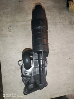 Mercedes Benz W204 C Class and W212 E Class M271 CGI oil cooler and oil filter housing