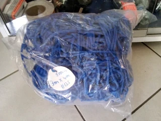 PROTECTIVE TARPAULINS,CARGO NETS &amp; CORNER PLATES AVAILABLE