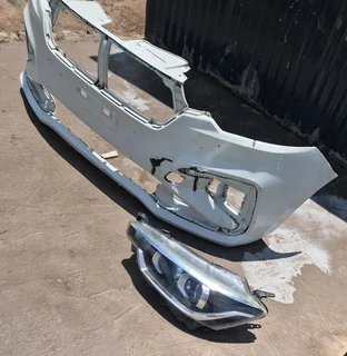 Suzuki ertiga or Toyota rumion front bumper and left headlight