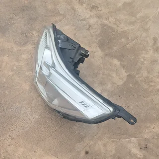 Chev utility left headlight