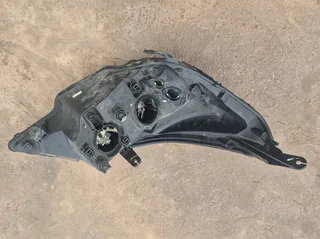 Chev utility left headlight