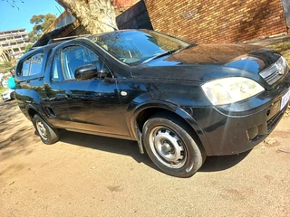 2010 CHEVROLET CORSA UTILITY BAKKIE 1.4 WITH CANOPY IN EXCELLENT CONDITION