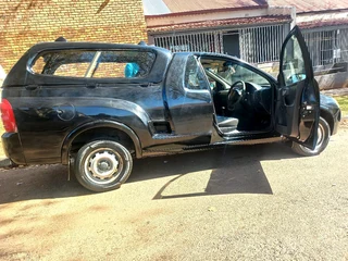 2010 CHEVROLET CORSA UTILITY BAKKIE 1.4 WITH CANOPY IN EXCELLENT CONDITION