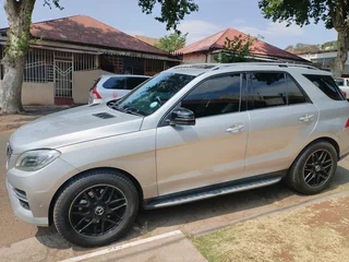 2012 MERCEDES BENZ ML 500 4MATIC 8 AUTOMATIC TRANSMISSION WITH SUN ROOF