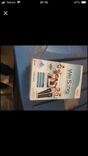 Wii in original box with 3 games and accesories