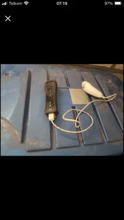 Wii in original box with 3 games and accesories