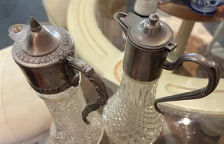 Antique silver plated cut glass jugs/ decanters (pair)