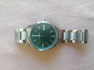 Daniel Klein Silver Plated Green Dial Stainless Steel Bracelet Watch