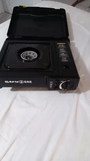 Gas stove portable in excellent condition.  R165, with new full canister