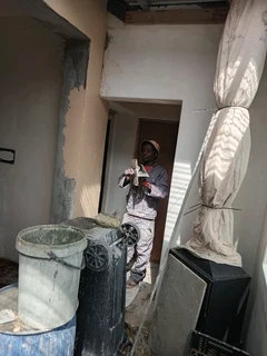 Skilled builder and plasterer