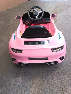 Girls electric ride on car Porsche Carrera pink color R2000 Cash