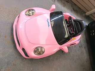 Girls electric ride on car Porsche Carrera pink color R2000 Cash