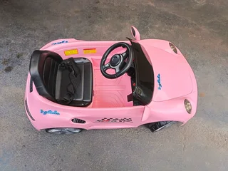 Girls electric ride on car Porsche Carrera pink color R2000 Cash