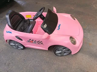 Girls electric ride on car Porsche Carrera pink color R2000 Cash
