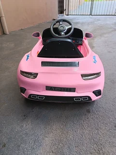 Girls electric ride on car Porsche Carrera pink color R2000 Cash