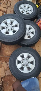 A set of 15inch Toyota hilux D4D mags and tyres for sale