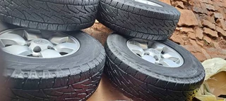 A set of 15inch Toyota hilux D4D mags and tyres for sale