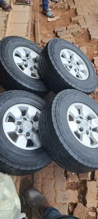 A set of 15inch Toyota hilux D4D mags and tyres for sale